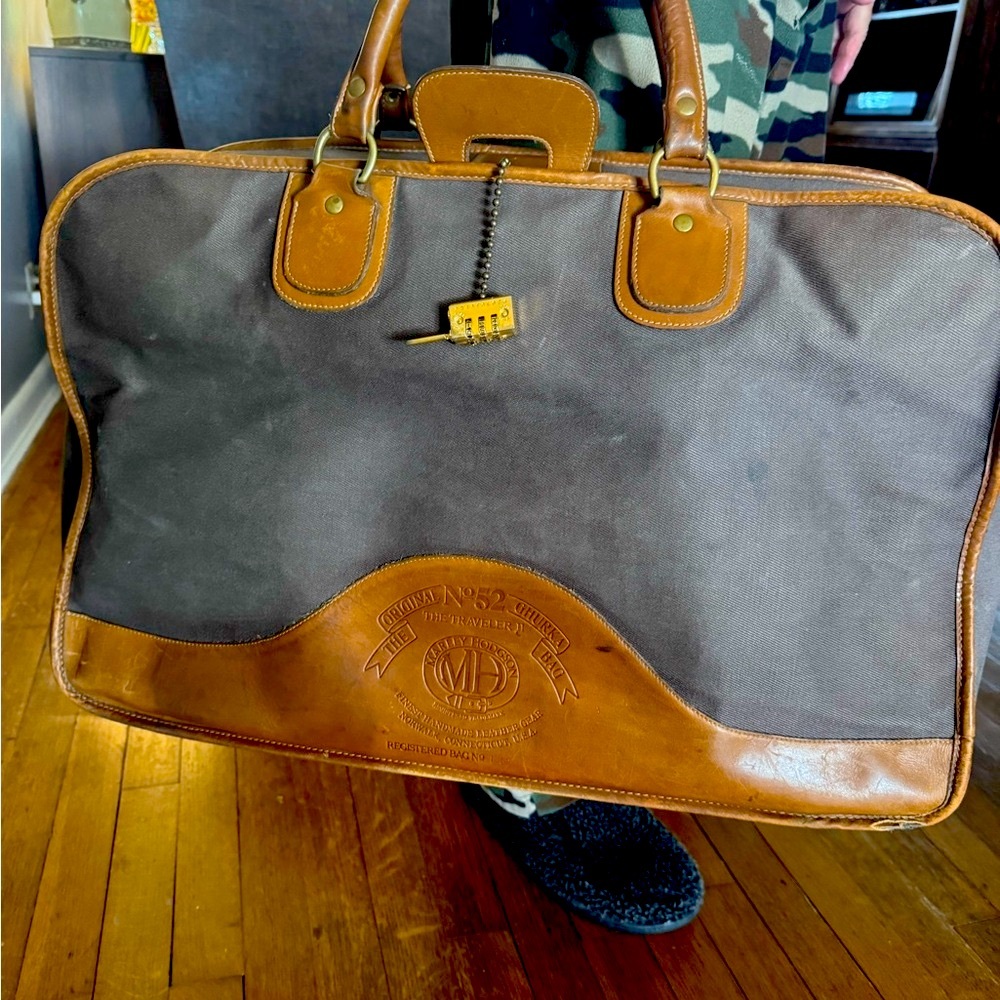 Brown and Tan Leather Travel Bag with Durable Design